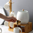 TEA CONTAINER WITH CUPS AND PLATES