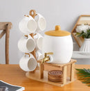 TEA CONTAINER WITH CUPS AND PLATES