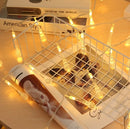 Solar LED string lights in the shape of water drops