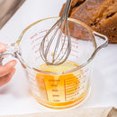 Glass measuring cup with handle and millimeter scale