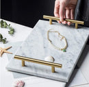 Nordic style natural marble storage tray for cosmetics and jewelry.