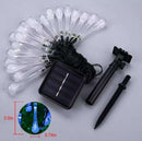 Solar LED string lights in the shape of water drops