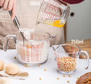 Glass measuring cup with handle and millimeter scale